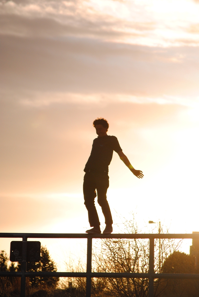 will. balancing on the top of the rail above a big drop. i didn't even include the gnarliness of this photo - the drop, so i failed. sorry will!