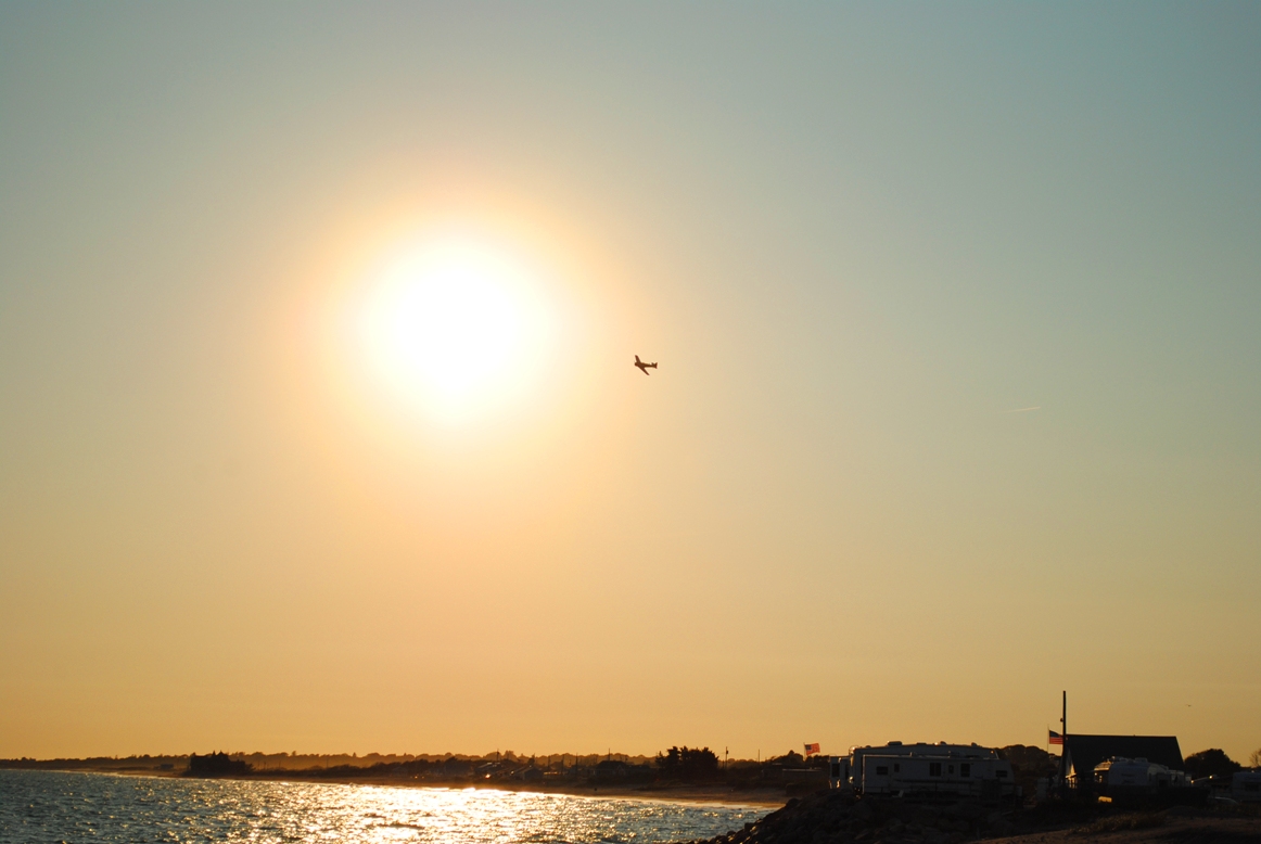 plane and sun