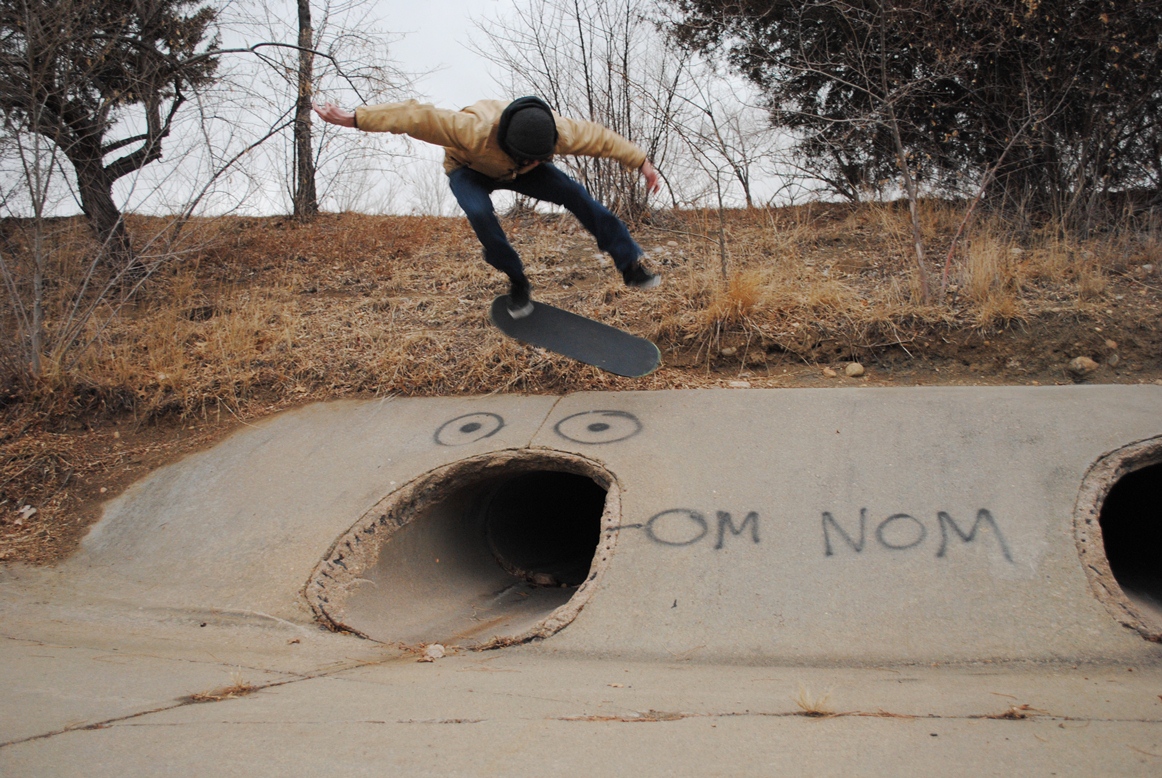 kickflip over the "om nom" spot